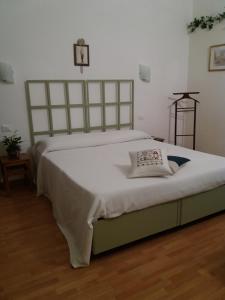 Giường trong phòng chung tại B&B il Cortile Malpensa