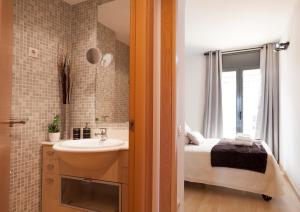 A bed or beds in a room at Apartment Beach Front Canet