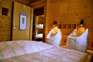 Letto o letti in una camera di Chalet Edelweiss