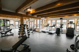 a gym with several treadmills and cardio machines at Tofino Resort + Marina in Tofino
