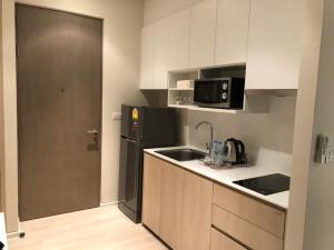 Kuchyň nebo kuchyňský kout v ubytování Veranda Residence Pattaya by IN