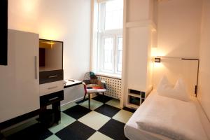 Postel nebo postele na pokoji v ubytování Hotel Cristall - Frankfurt City + 37 fotografií