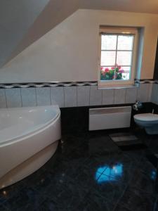 Vannituba majutusasutuses Homestay Svatá
