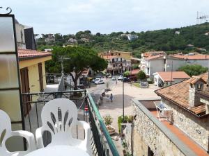 a view from a balcony of a town with a street at Parigino in Palinuro