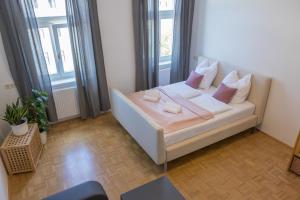 A bed or beds in a room at Kingsize Central Station Residence