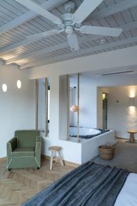 A bed or beds in a room at Yacht Boheme Hotel-Boutique Class - Adults Only