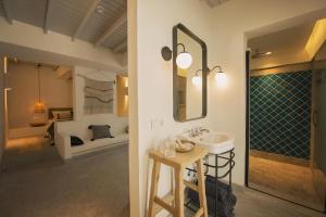 A bed or beds in a room at Yacht Boheme Hotel-Boutique Class - Adults Only