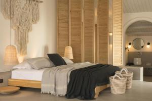 A bed or beds in a room at Yacht Boheme Hotel-Boutique Class - Adults Only