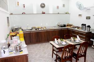 Um restaurante ou outro lugar para comer em Pousada Luar da Serra