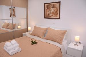 Posteľ alebo postele v izbe v ubytovaní Keratea Apartment Athens Airport