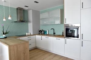 Kuchyňa alebo kuchynka v ubytovaní Apartament Turkus
