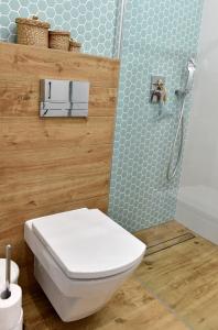 Kúpeľňa v ubytovaní Apartament Turkus