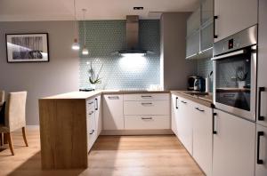 Kuchyňa alebo kuchynka v ubytovaní Apartament Turkus