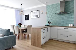 Kuchyňa alebo kuchynka v ubytovaní Apartament Turkus