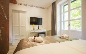 Posteľ alebo postele v izbe v ubytovaní Well Of Life Luxury Rooms