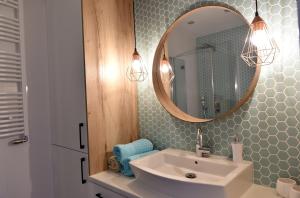 Kúpeľňa v ubytovaní Apartament Turkus