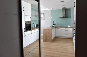 Kuchyňa alebo kuchynka v ubytovaní Apartament Turkus