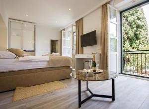 Posteľ alebo postele v izbe v ubytovaní Well Of Life Luxury Rooms