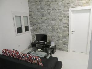 TV a/nebo společenská místnost v ubytování Vila Velvet