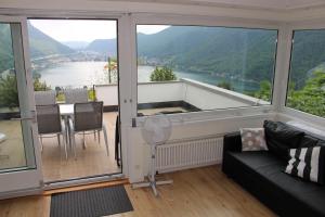 a living room with a view of a river at Residenza Trivento app. 9 in Rovio