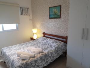 Кровать или кровати в номере Sweet comfort Apartment in Rio