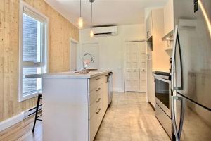 Køkken eller tekøkken på INITIAL - ARCHITECTE - Centre-Ville de Québec