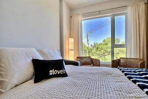 En eller flere senge i et værelse på INITIAL - ARCHITECTE - Centre-Ville de Québec