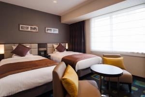 Postel nebo postele na pokoji v ubytování Hotel Mystays Premier Akasaka