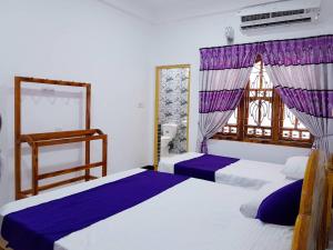 Voodi või voodid majutusasutuse SNP Star Guest House toas