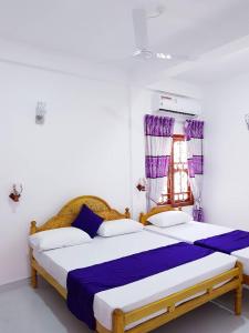 Voodi või voodid majutusasutuse SNP Star Guest House toas