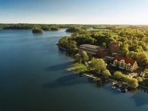 an aerial view of a building on an island in a river at Hotel Barlinek in Barlinek