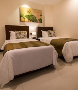 Ένα ή περισσότερα κρεβάτια σε δωμάτιο στο Rococo Residence +35 φωτογραφίες