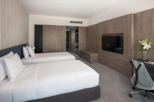 En TV eller et underholdningssystem på G Hotel Gurney