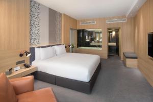 En TV eller et underholdningssystem på G Hotel Gurney