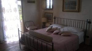 A bed or beds in a room at Bed and Breakfast Posserle