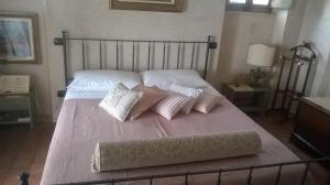 A bed or beds in a room at Bed and Breakfast Posserle