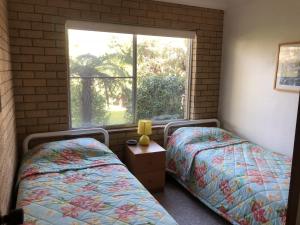 
A bed or beds in a room at Flat 1-3 Bay Lane
