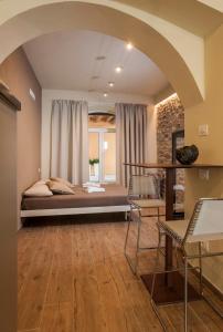 Posteľ alebo postele v izbe v ubytovaní La Bellavita Del Garda Luxury Apartments