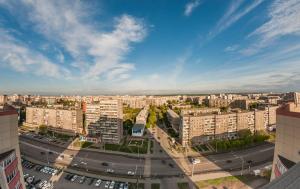 an aerial view of a city with tall buildings at Business-hall Panorama in Magnitogorsk
