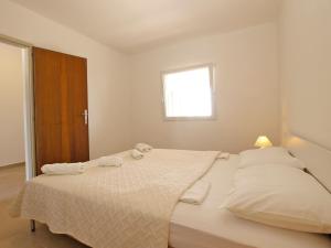 Postel nebo postele na pokoji v ubytování Apartment 1215