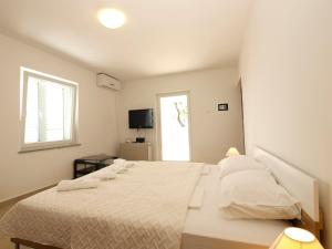 Postel nebo postele na pokoji v ubytování Apartment 1215