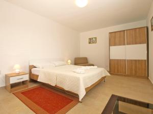 Postel nebo postele na pokoji v ubytování Apartment 1215