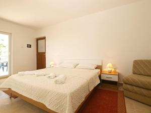 Postel nebo postele na pokoji v ubytování Apartment 1215