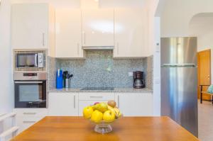 A kitchen or kitchenette at Es Pont Den Teulari Nou