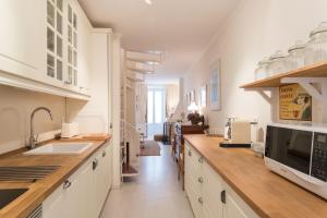 Η κουζίνα ή μικρή κουζίνα στο FLH Ericeira Charming House