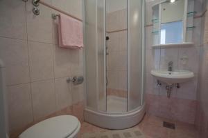 Koupelna v ubytování Apartments Topo
