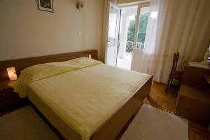 Postel nebo postele na pokoji v ubytování Apartments Topo