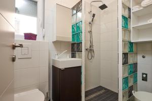 Kúpeľňa v ubytovaní Fratelli apartments