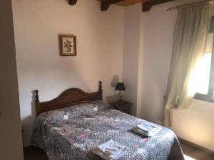 Postel nebo postele na pokoji v ubytování Hotel Restaurante Calderon