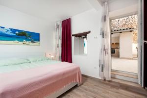 Postel nebo postele na pokoji v ubytování La Svalba Rooms & Studios